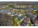 Lovely aerial perspective showcasing a residential community surrounded by serene lakes and greenery at 19476 Paddock View Dr, Tampa, FL 33647