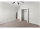 Bedroom featuring a ceiling fan, a closet, and a window at 19476 Paddock View Dr, Tampa, FL 33647