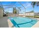 Sparkling pool with screened enclosure for outdoor enjoyment and privacy at 22516 Magnolia Trace Blvd, Lutz, FL 33549