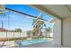 Inviting screened-in pool area provides a relaxing outdoor living space with serene views at 22516 Magnolia Trace Blvd, Lutz, FL 33549