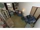 Inviting bedroom with unique decor, including a cozy chair and stylish storage solutions at 2332 Seward Dr, Sarasota, FL 34234