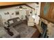 Spacious living room with a fireplace and wooden ceiling beams at 2332 Seward Dr, Sarasota, FL 34234