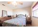 Cozy bedroom with a comfortable bed, dresser, and ample natural light for a relaxing ambiance at 2466 Lake View Blvd, Port Charlotte, FL 33948