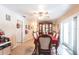 Formal dining room featuring a ceiling fan and French doors leading to the outside at 2466 Lake View Blvd, Port Charlotte, FL 33948