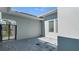 Private courtyard with paver flooring and gated access, offering an intimate outdoor space at 33759 Ocean Spray Ln, Wesley Chapel, FL 33543