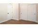 Bedroom with hardwood floors, a window, and a closet at 4019 W Lemon St, Tampa, FL 33609
