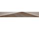 A close up on the light colored hardwood flooring at 4019 W Lemon St, Tampa, FL 33609