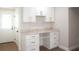 Functional home office space with custom cabinets, ample counter space, and natural light at 4019 W Lemon St, Tampa, FL 33609