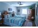 Well-appointed guest bedroom with twin beds, ample storage space, and charming decor at 4108 Daisy Dr, Hernando Beach, FL 34607