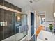 Stylish bathroom with a tub and shower combination and modern finishes at 524 Park S St, St Petersburg, FL 33707