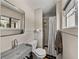 Modern bathroom featuring sleek fixtures, shower with curtain, and neutral tones for a relaxing space at 524 Park S St, St Petersburg, FL 33707