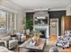 Well-lit living room featuring a fireplace, stylish decor, and an inviting atmosphere at 524 Park S St, St Petersburg, FL 33707