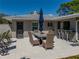 Outdoor patio with a table, chairs, umbrella, and an outdoor bar at 524 Park S St, St Petersburg, FL 33707