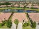 An aerial view of a home showcasing its tile roof and surrounding community at 5638 Sunset Falls Dr, Apollo Beach, FL 33572