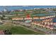 Aerial view of community with a pool, golf course, and water view at 6181 Bahia Del Mar Blvd # 112, St Petersburg, FL 33715