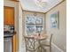 Cozy breakfast nook with natural light and views of the surrounding landscape at 6181 Bahia Del Mar Blvd # 112, St Petersburg, FL 33715