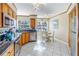 Charming kitchen featuring stainless steel appliances and a cozy breakfast nook at 6181 Bahia Del Mar Blvd # 112, St Petersburg, FL 33715