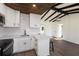 Modern kitchen with stainless steel appliances, white subway tile backsplash, and an island at 679 71St N Ave, St Petersburg, FL 33702