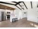 Bright kitchen featuring stainless steel appliances, white cabinets, and quartz countertops at 679 71St N Ave, St Petersburg, FL 33702