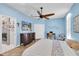 Spacious main bedroom features an en-suite bathroom, accent lighting, and a ceiling fan at 6841 Collingswood Ct, New Port Richey, FL 34655