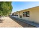 Backyard view of a single-Gathering house featuring a low-maintenance gravel at 6905 El Camino Paloma St, Port Richey, FL 34668
