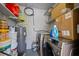 Functional laundry room and storage area, including washer and dryer at 8006 N Ola Ave, Tampa, FL 33604
