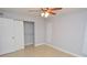 Bedroom with closet, tiled floor, and one window at 8647 Mallard Reserve Dr # 104, Tampa, FL 33614