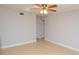 Spacious living room with tile floors and a ceiling fan at 8647 Mallard Reserve Dr # 104, Tampa, FL 33614