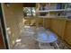 This patio has an outdoor table and overlooks the property at 8647 Mallard Reserve Dr # 104, Tampa, FL 33614
