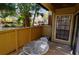 This patio has an outdoor table and overlooks the property at 8647 Mallard Reserve Dr # 104, Tampa, FL 33614