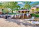 Gather with friends in this lovely poolside cabana with chairs and tables at 8647 Mallard Reserve Dr # 104, Tampa, FL 33614
