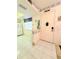 Entryway featuring tile floors and a view into the kitchen at 946 Virgina # 304, Dunedin, FL 34698