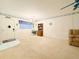 Living room with carpet floors and a view of the front door at 946 Virgina # 304, Dunedin, FL 34698