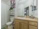Bathroom with a shower/tub combination, functional vanity with storage, and neutral decor at 10205 Courtney Palms Blvd # 304, Tampa, FL 33619