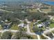 Property with mature trees and surrounding neighborhood at 12005 Wren Ct, New Port Richey, FL 34654