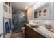 Beautiful bathroom featuring a glass shower and custom vanity sink with stylish countertop at 12005 Wren Ct, New Port Richey, FL 34654