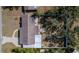 Aerial view of house showing backyard, patio and driveway at 1316 W Hiawatha St, Tampa, FL 33604
