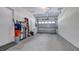 Spacious garage with ample storage and an automatic door, ideal for multiple vehicles at 1316 W Hiawatha St, Tampa, FL 33604