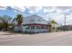 Corner building with Curaleaf signage, blending into a vibrant city street at 1316 W Hiawatha St, Tampa, FL 33604