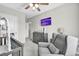 Bedroom featuring chair, crib, and dresser at 16849 Trite Bend St, Wimauma, FL 33598