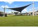 View of the expansive event lawn with concert stage at 16849 Trite Bend St, Wimauma, FL 33598