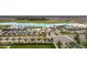 Aerial view of the Lagoon community featuring sandy beaches and turquoise water at 16849 Trite Bend St, Wimauma, FL 33598