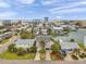 Aerial view of waterfront neighborhood and nearby ocean at 17404 1St E St, Redington Shores, FL 33708