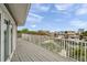 Grey deck with white railing offering scenic water views and a peaceful outdoor experience at 17404 1St E St, Redington Shores, FL 33708