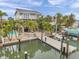 Stunning waterfront home with a private pool, dock, and boat lift, ideal for luxurious coastal living and enjoying water activities at 17404 1St E St, Redington Shores, FL 33708