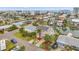 Beautiful waterfront home with lush landscaping, palm trees, and a private dock perfect for boating and enjoying water activities at 17404 1St E St, Redington Shores, FL 33708