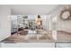 Open-concept kitchen with a marble island and seamless view into the bright and airy living space at 17404 1St E St, Redington Shores, FL 33708