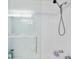 Clean, bright shower with glass door and updated shower head at 17404 1St E St, Redington Shores, FL 33708