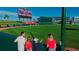 View of the baseball field on a sunny day from the perspective of the audience at 17976 Foxtail Loop, Venice, FL 34293