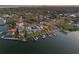 Amazing aerial view of waterfront property, featuring lush greenery, docks, and serene open water at 1843 Bayou Grande Ne Blvd, St Petersburg, FL 33703